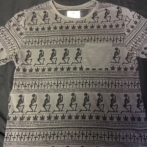 On the Byas Skulls Crosses and Cannabis Pocked Tee
